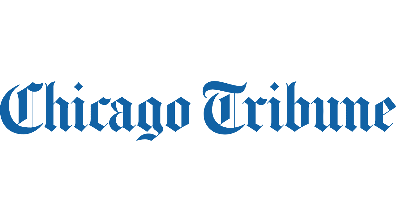 A green background with the words chicago tribune written in blue.